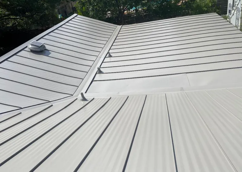 Solar attic fan installed on a metal roof for Roof Ventilation in Sausalito